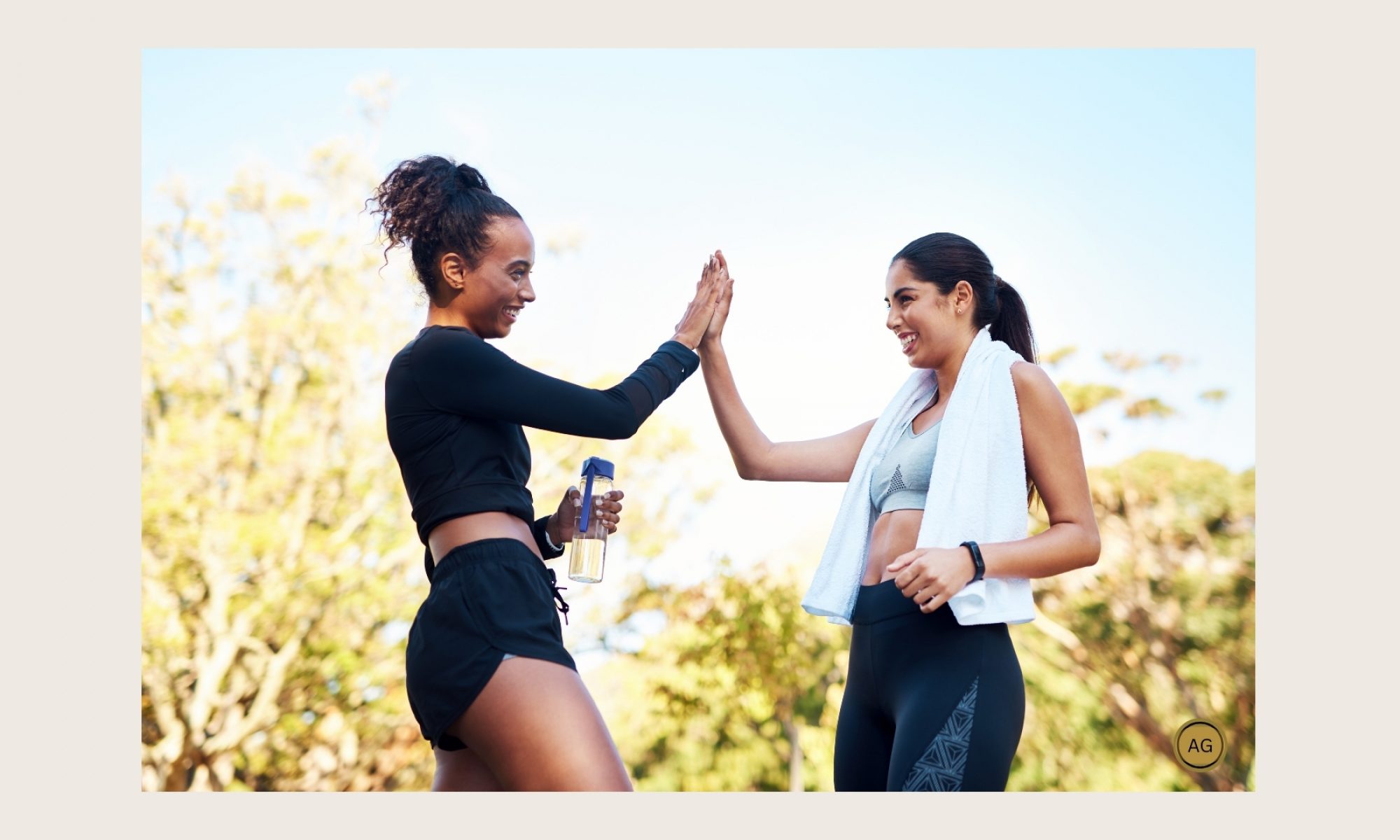 two women high-fiving after a run